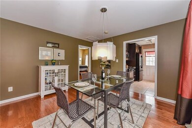 dining room opens to kitchen and Master on main