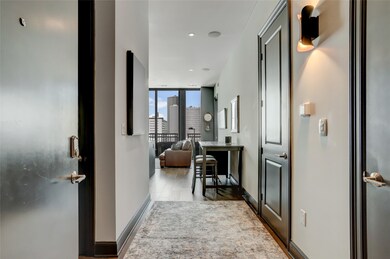 As you walk in, you're welcomed by a foyer that le