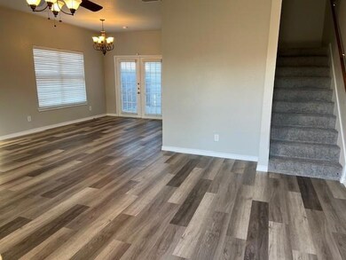 Unfurnished room featuring dark wood-type flooring