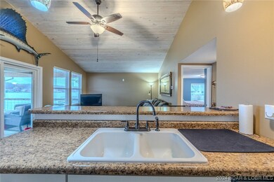 Open concept living, kitchen.