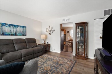View from the entry towards large dine in kitchen.