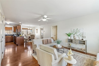 open floor plan living room/ dining room