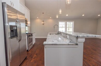 Stainless Steel appliances, pendant lighting, soft