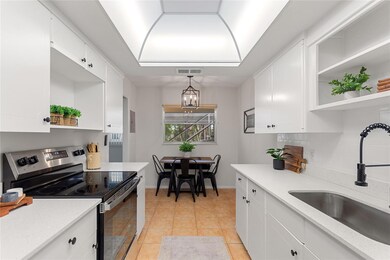 Kitchen and eat in kitchen area
