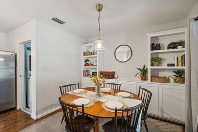 Dining space featuring dark hardwood / wood-style 