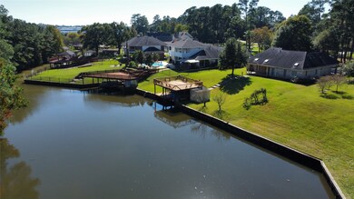 View of the back of the house as well as freshly remodeled sunning deck!