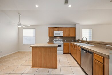 Kitchen with built-in island.