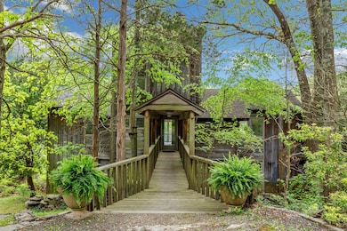 Main House includes Detached 3-Car Carport and Circular Driveway