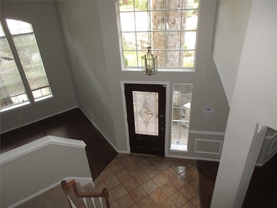 Dramatic entryway with tons of natural light, high