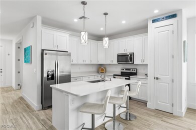 Sparkling quartz countertops. Great place to gather after a dau at the beach!
