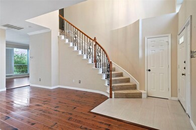 Elegant staircase leading to the second level.