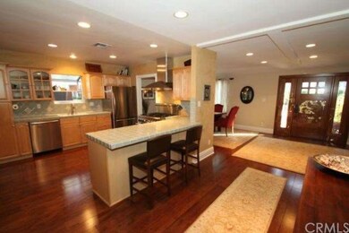 Gorgeous entry with gleaming wood floors.  Beautif