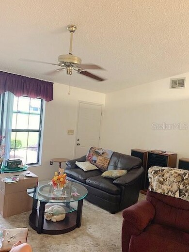 Front door enters into the living room.