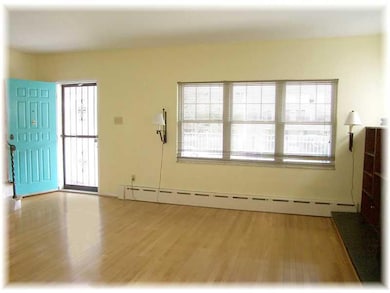 Entry/Foyer. living area with view onto front porc