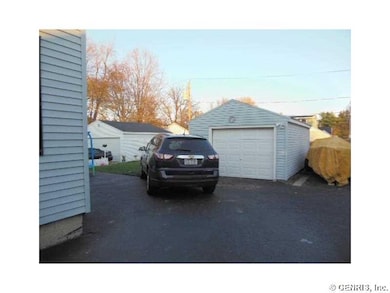 Garage DETACHED GARAGE AND A LARGE PAVED AREA FOR 