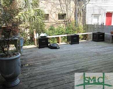 Exterior Front. Community deck shared by 3 units.