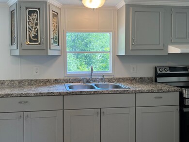 fresh updated cabinets, counters & range