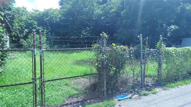View of yard featuring a gate