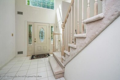 Foyer to side of stairs