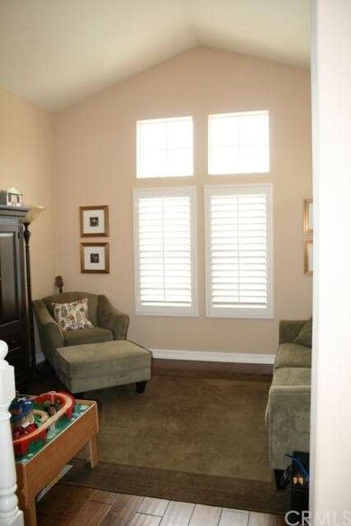 Living room with vaulted ceilings, great place for