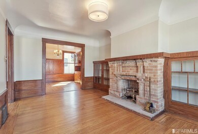 LIVING ROOM LOOKING TOWARD FORMAL DINING ROOM. ORI
