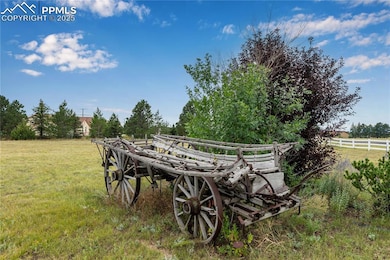 View of yard with a view of countryside