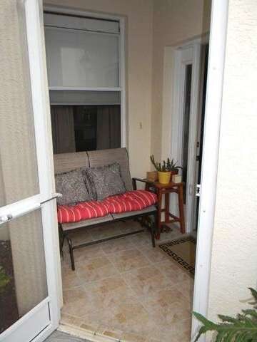 Screened In Front Patio with Tiled Floors