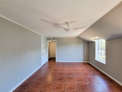 The living room features a built-in for additional