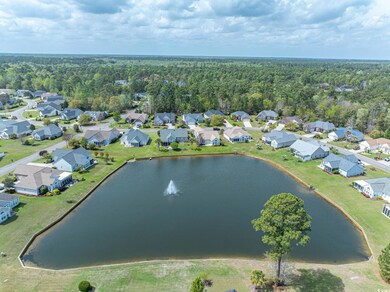 Drone / aerial view with a residential view, a wat