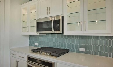 Glass Inserts at Kitchen Cabinets
