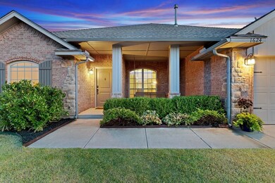Front entry and covered porch view with swing