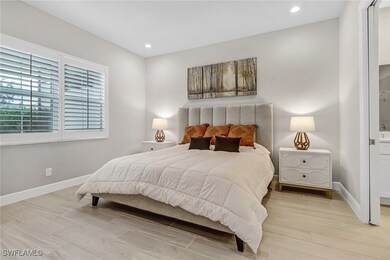 Bedroom featuring recessed lighting, baseboards, a