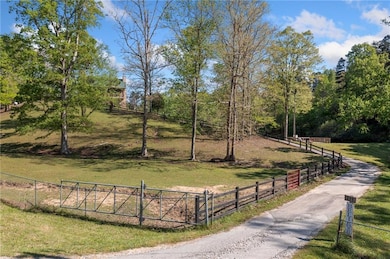 View of property's community featuring a lawn and 