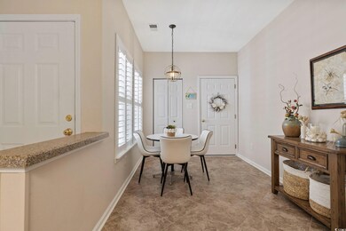 Dining space with baseboards and visible vents