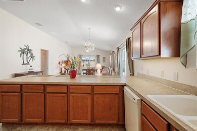 Kitchen with access to dining area