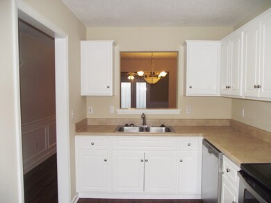Kitchen Has Pass Thru To Dining Room