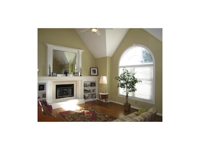 Formal Living Room w/ Custom Fireplace & Built-ins