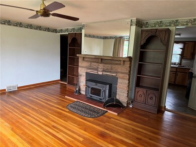 Another view of the living room with a peek into t