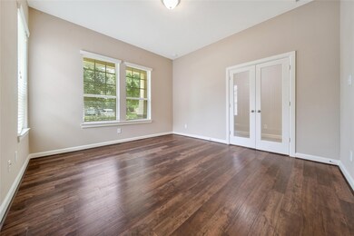 Sun-drenched space with elegant windows.