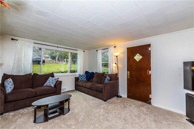 Large 17x12 living room with tons of natural light