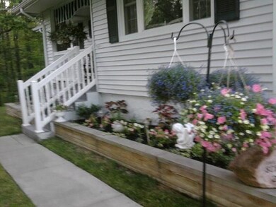 beautifully landscaped in the summer!