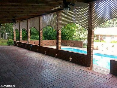 Pool - Huge brick Cabana overlooks inground pool.