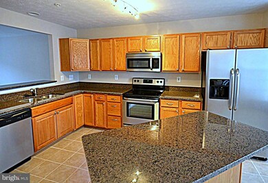 215 Oliver Heights Rd, Windsor Mill, MD 21244 - photo 2