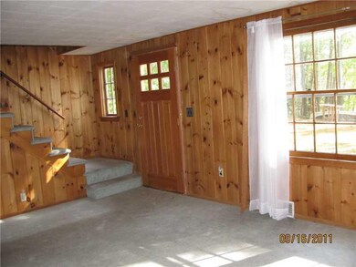 Living Room. Stairs leading to 2nd....