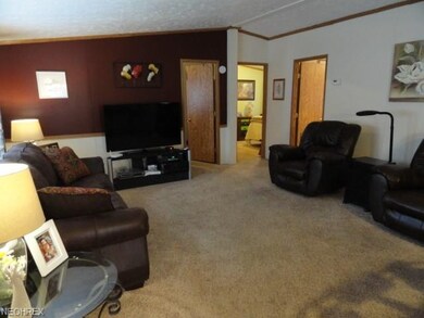 This cozy living room is ready for new family memo