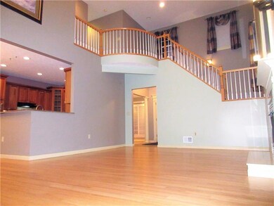 Additional features of the living room are the ope