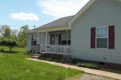 Enjoy relaxing on this spacious front porch.