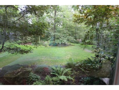 View. REAR YARD PROFESSIONALLY LANDSCAPED.
