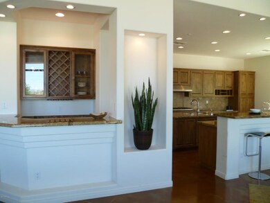 Wet bar(off fam. room) w/ granite cntrs