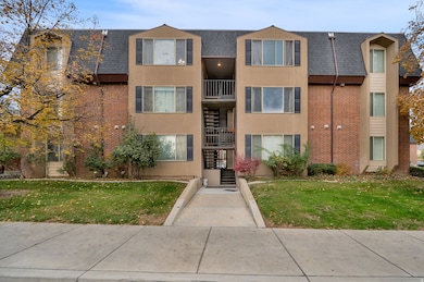 View of apartment building / complex featuring stairway